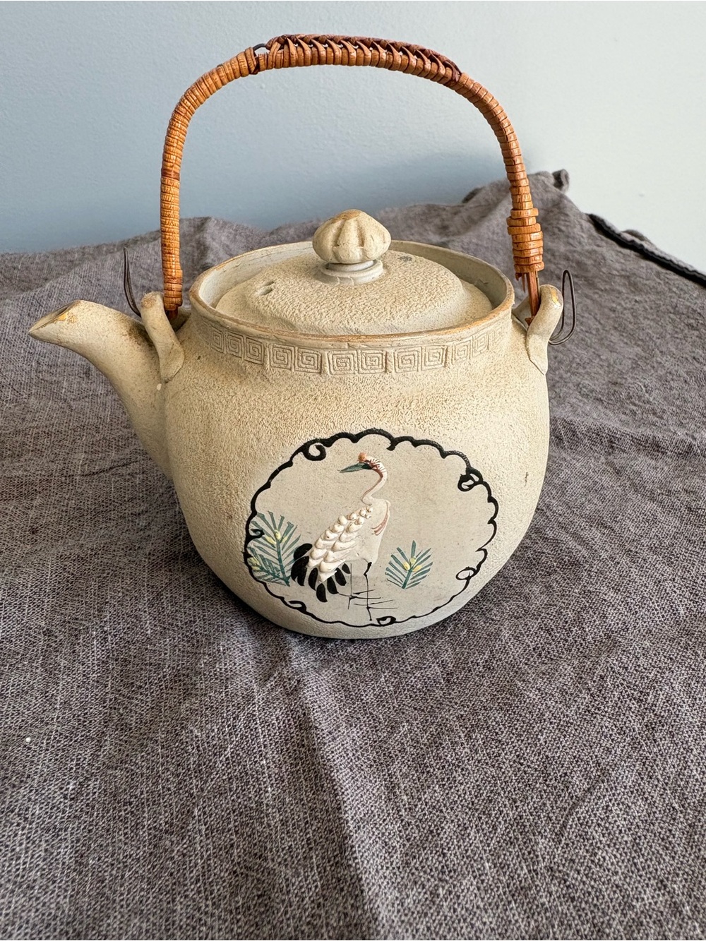 Cream Ceramic Crane Teapot with Woven Handle